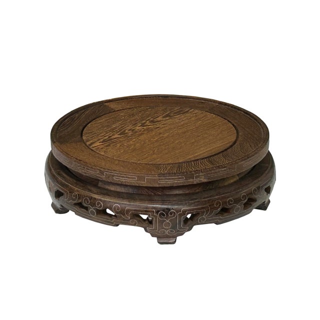 Showcase your items with the Light Brown Feather Pattern Round Wood Display Stand, featuring a stunning wire inlay motif....