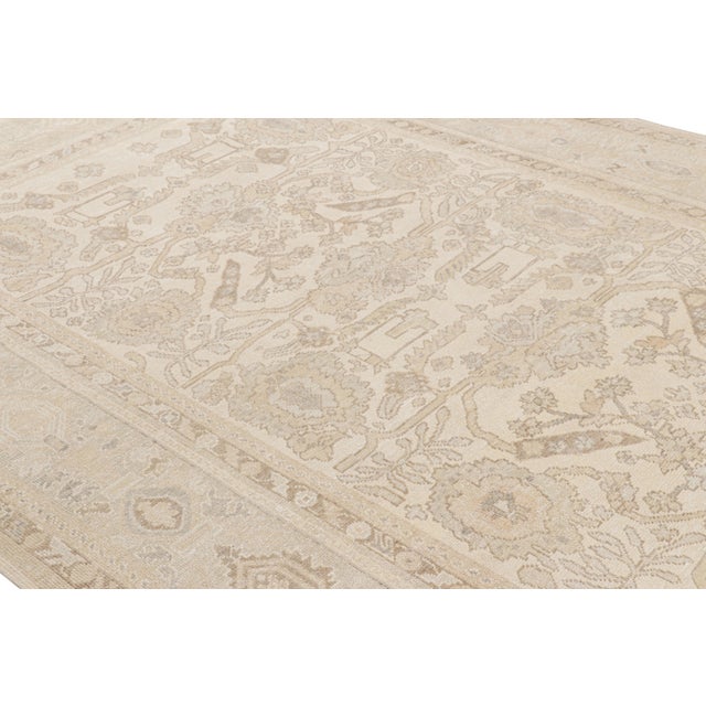 Hand-knotted in wool and silk, this 9x12 rug, originating from India, is from a new line of Rug & Kilim’s Modern Classics...