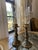 vintage brass and glass hurricane lamp featuring a classic patinated base and a clear glass chimney. Excelente condition