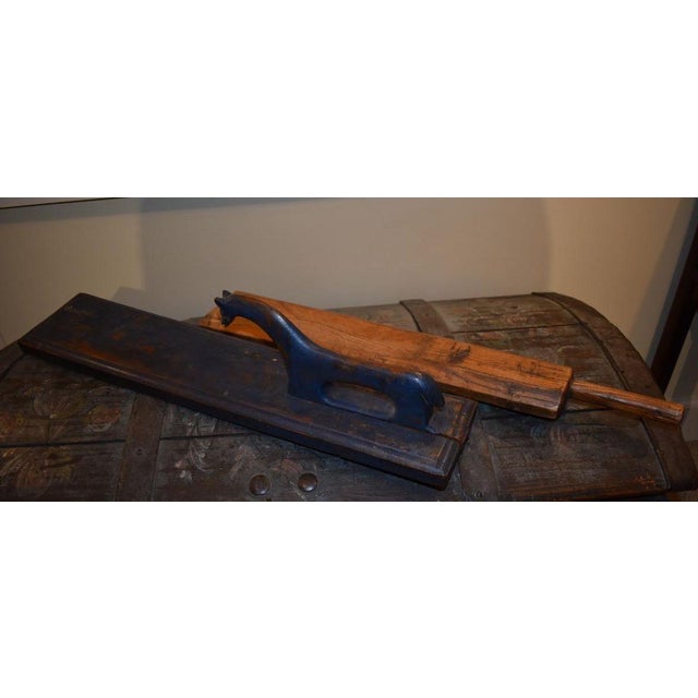 Two Norwegian Mangle Boards, 18th or 19th century, made for smoothing linens before stacking. The one at the right is...