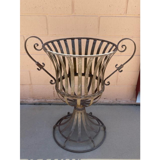 Vintage Hand Wrought Iron Urn, originally these would have a large terra-cotta pot placed in them with ferns. You can also...