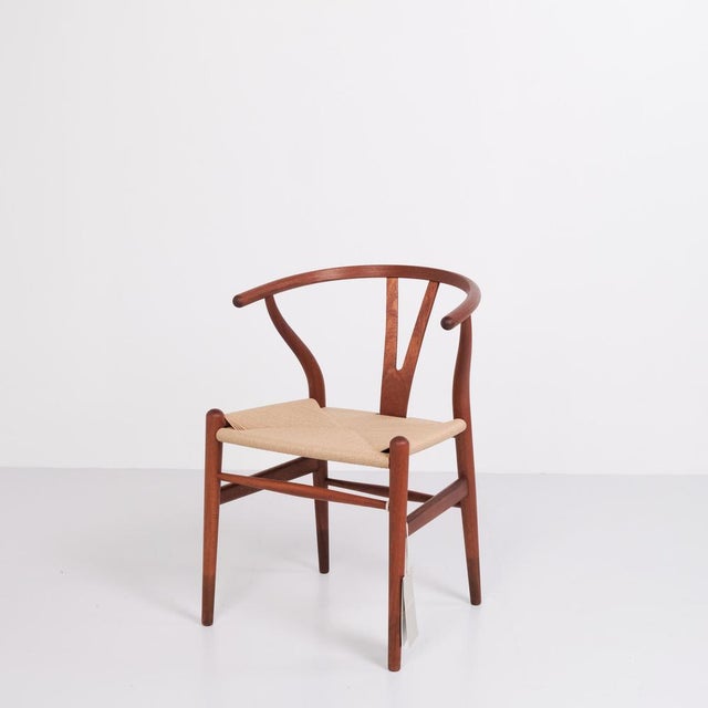 Set of four hans j. Wegner wishbone-chairs, model ch24. Mahogany with natural wicker. Carl hansen & søn. — origin: denmark...