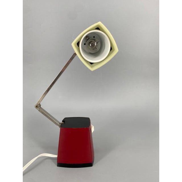 A desk lamp * Designed by Tada Kiko for Taki Light * Model "Iris TL-84" * Functional, minimalist design * Suitable as a...