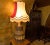 Original antique lamp made from a solid wooden hub of an old rickshaw wheel, probably from a farm wagon or cart. The body...