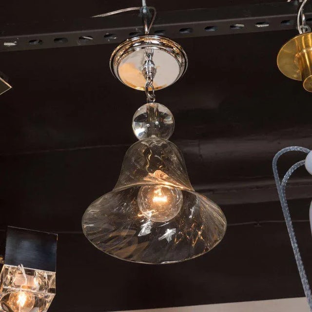 This elegant pendant was handblown on the legendary island of Murano, off the coast of Venice, which has been producing...