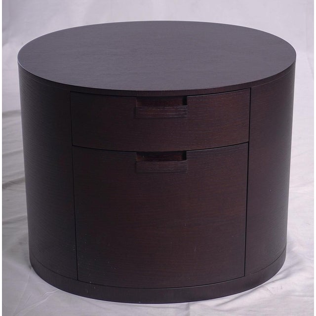 B&B Italia Maxalto Amphora Night Table brings refined Italian craftsmanship and sculptural simplicity to modern interiors....