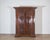 A magnificent 17th-century Lombard wardrobe from the Brescia-Bergamo region, masterfully crafted in solid walnut during...