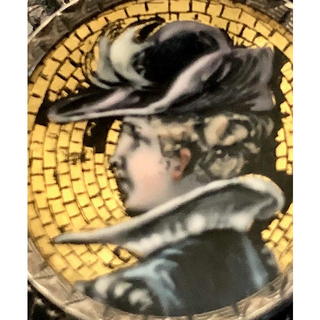 You know how you love to shop for a souvenir when you travel. This little micro mosaic brooch—about the width of your...