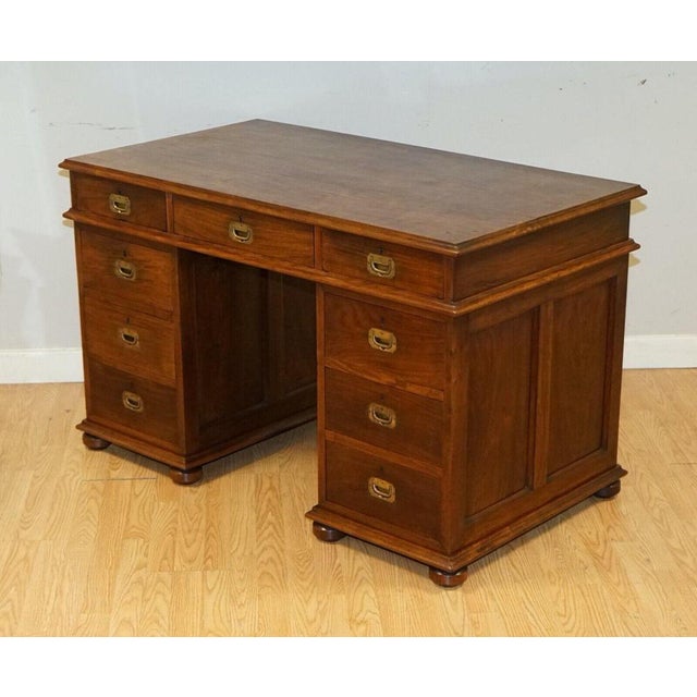 The Antique Rare Victoria Regina Military Campaign Pedestal Desk, circa 1880, is a truly exceptional piece of furniture...