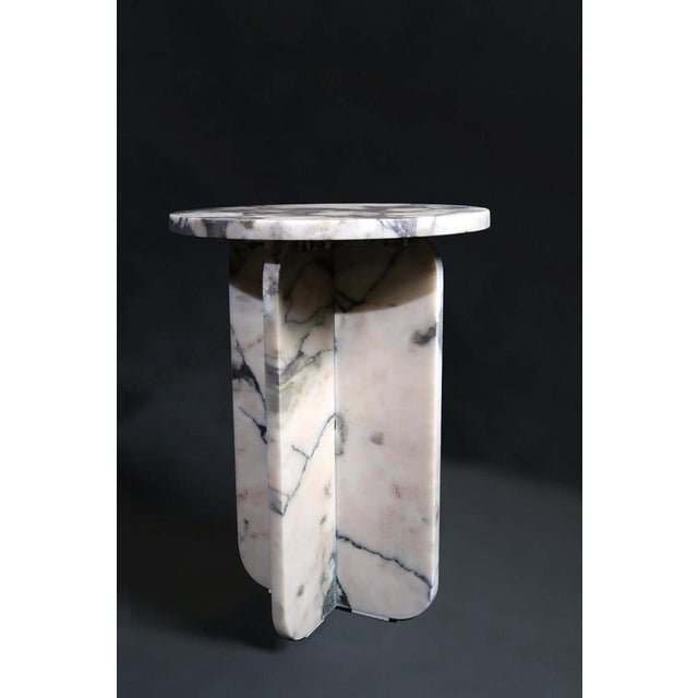 Mensa Side Table in Calaccata Vola by Manifeste, in New conditions. Designed from 2000 Labeled by Maker