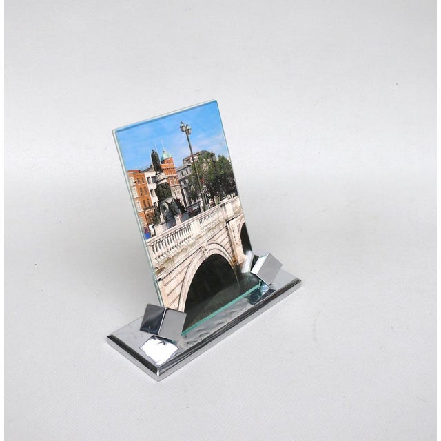 A picture frame from the time of Art Deco, made in Germany. The base is made of solid metal, the surface is edited by hand...