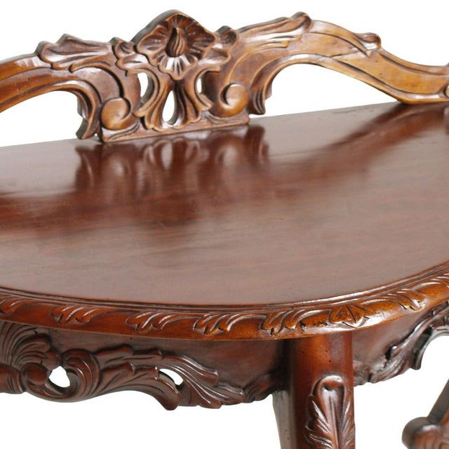 Elegant and highly decorative venetian demilune console in carved mahogany, attributed to eugenio quarti and his workshop...
