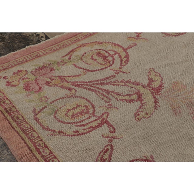 Handwoven in premium wool and originating circa 1890-1899, this 11x13 antique French Aubusson rug emerges from the...