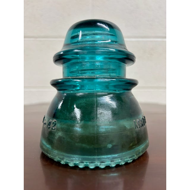 This is a gorgeous aqua or teal vintage glass Hemingray insulator. “Hemingray-42” Several insulators in stock of different...
