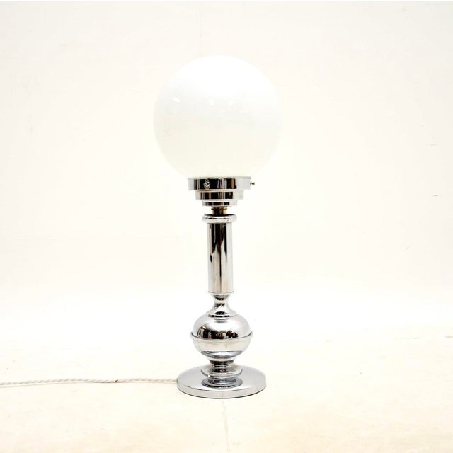 A stylish and very well made Art Deco chrome and glass table lamp, made in England and dating from around the 1930’s. This...