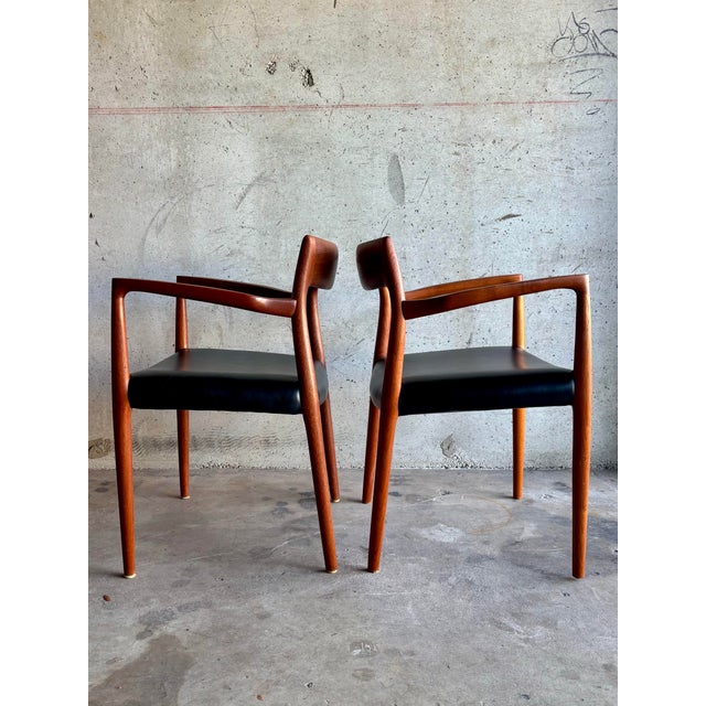 This exceptional early pair of Model 57 armchairs by Niels Otto Møller represents the purest expression of Danish Modern...