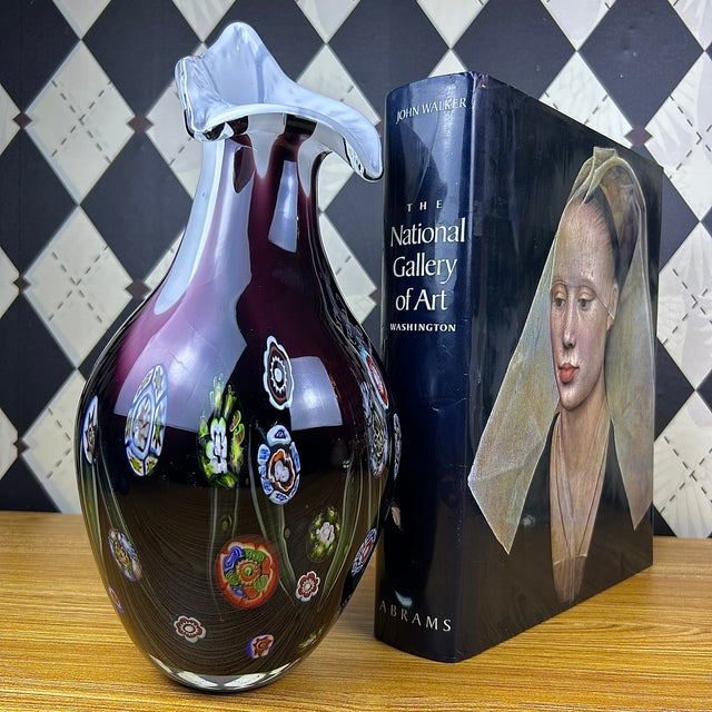 Large sculptural blown art glass vase in deep amethyst purple, decorated with multicolored millefiori-style floral murrine...