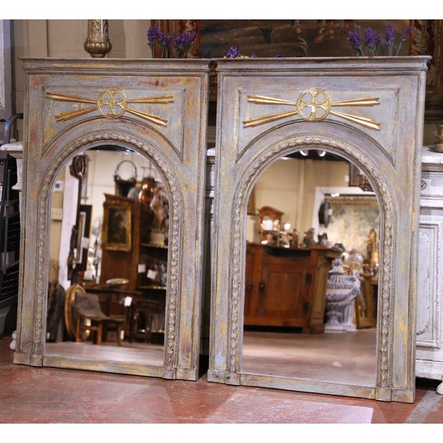 This refined pair of antique French painted trumeau mirrors embodies the elegance of the Louis XVI Revival style, defined...