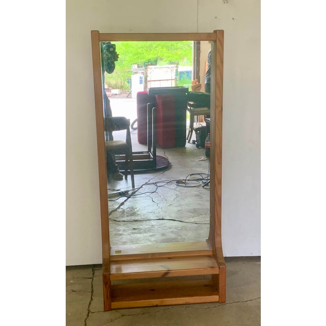 This solid oak Swedish made large wall mount mirror with shelf, is quite a stunning and rare piece. Manufactured by Glass...