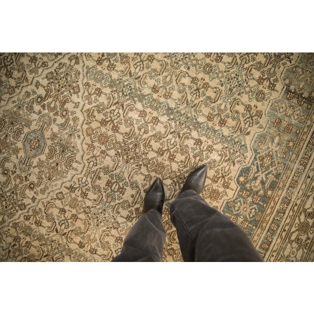 :: Single center diamond shaped medallion with arrowed finials atop an abrashed ground and field overlays, all being a...