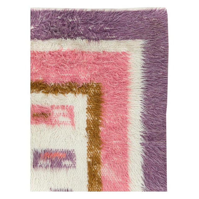 A vintage Turkish Tulu accent rug handmade during the mid-20th century. Measures: 4' 10" x 6' 10".