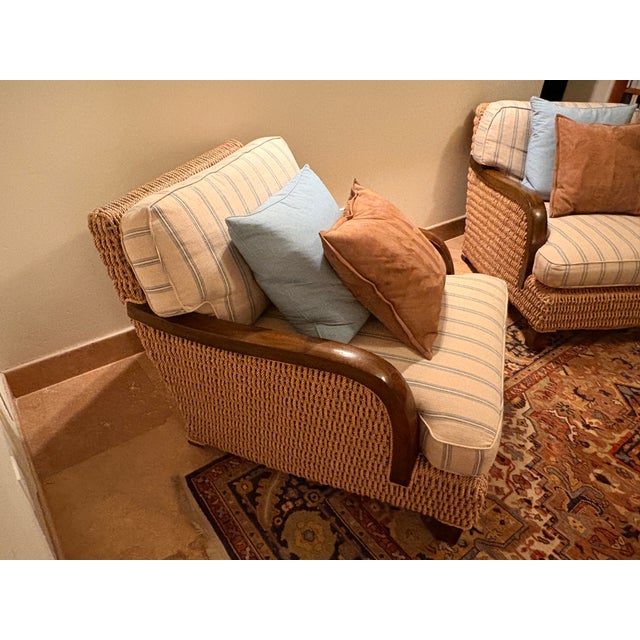 Great condition. Signs of use on wooden surfaces. Rattan intact with no rips, tears or stains. Cushions...