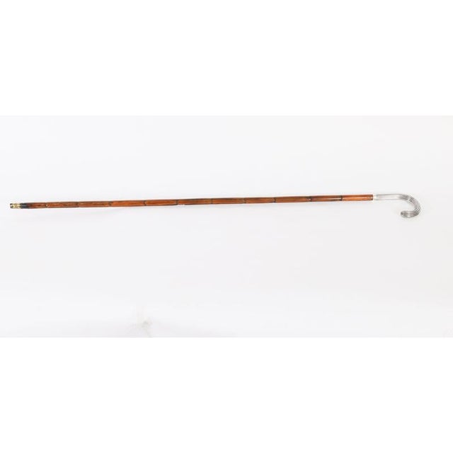 This is a beautiful antique Continental silver walking cane, circa 1900 in date. The striking stick features an ornate...