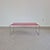 Simple lines, bold red and polished chrome give this side table a modernist look that remains fresh and appealing decades...