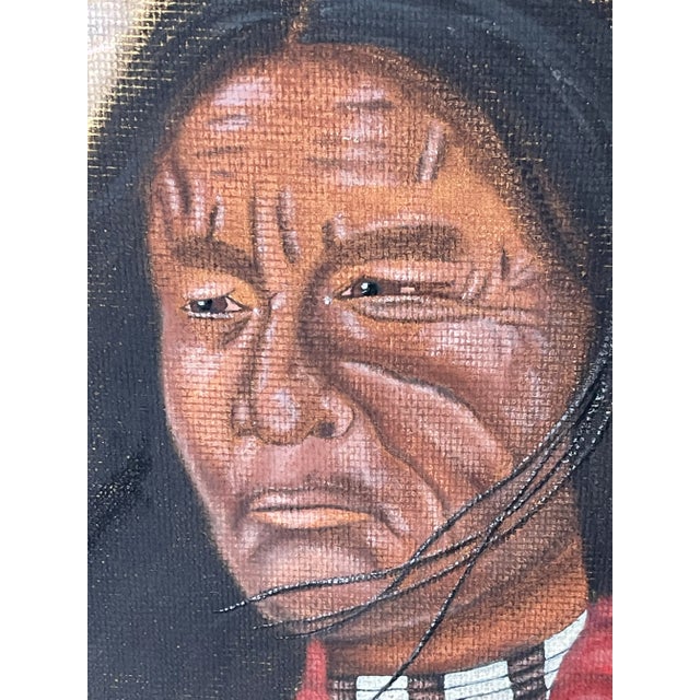 Vintage portrait on board of a Native American Chief. Signed lower left and framed in a hardwood frame.