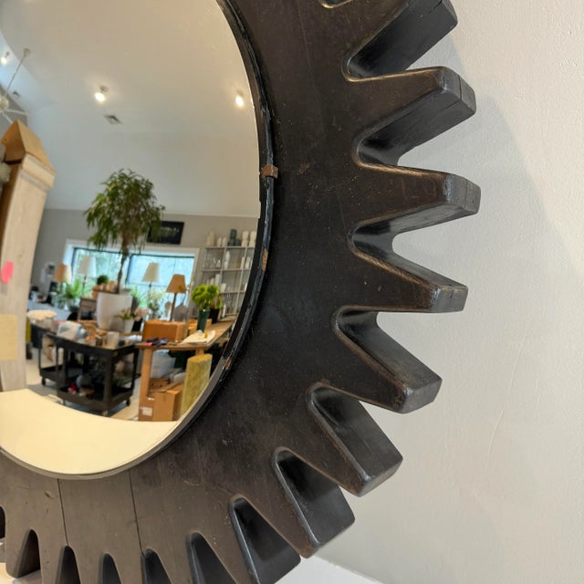 Large Vintage Convex Mirror. Gear shaped and painted black round “frame” with a convex mirror.