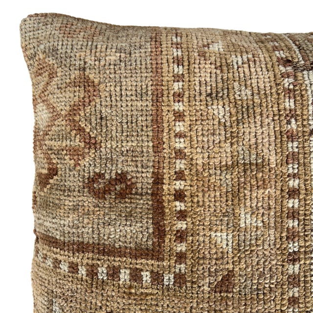 Crafted from an authentic vintage Turkish rug, this one-of-a-kind pillow showcases the beauty of traditional handwoven...
