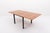 Modern Italian design foldable dining table with beautiful varnished walnut top and black coated steel legs. Condition...