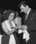 Elizabeth Taylor And Rock Hudson American actor Rock Hudson (1925 - 1985) dries the hands of actress Elizabeth Taylor...