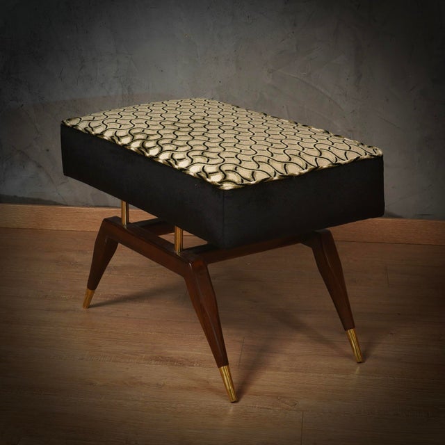 A charming pouf with a very simple shape in the style of Gio Ponti, rectangular and embellished with a beautiful black and...