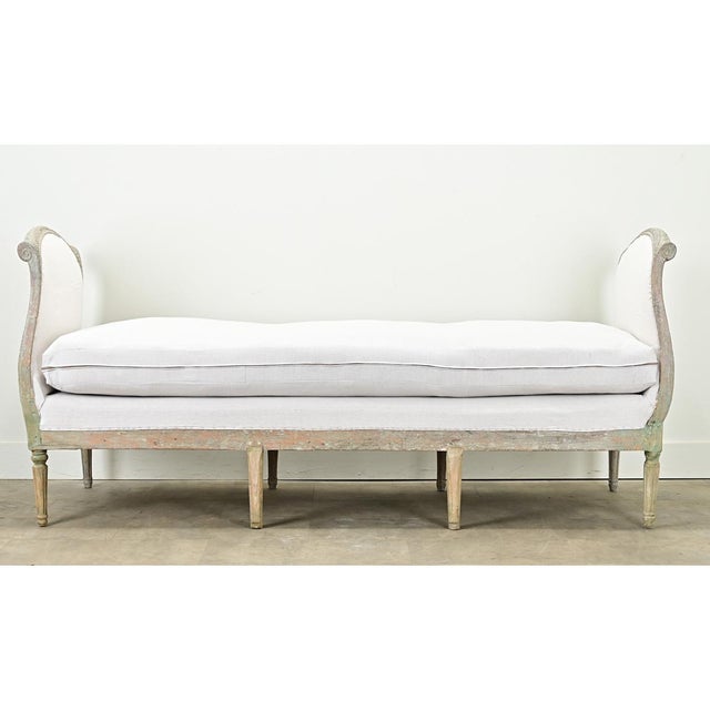 Dimensions: 38 ¼” H x 84 ⅞” W x 28 ¼” D An impressive (and long) Swedish Gustavian daybed from the 1790s. The bed frame is...