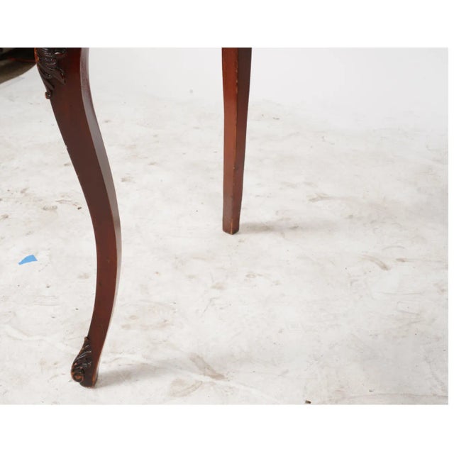 Description: A Continental Marquetry Turtle-Top Table late 20th century Dimensions: 29 1/2 x 37 1/2 x 26 in.