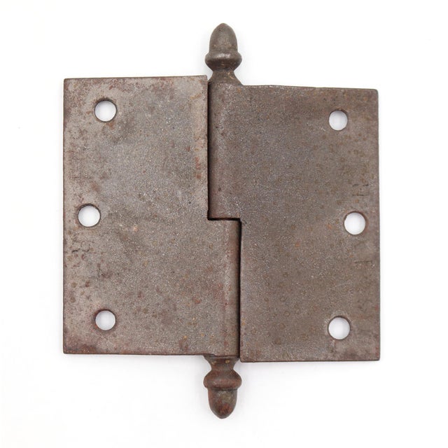This door hinge is made of cast iron with acorn tips, a lift off knuckle, and a template hole pattern. The original...