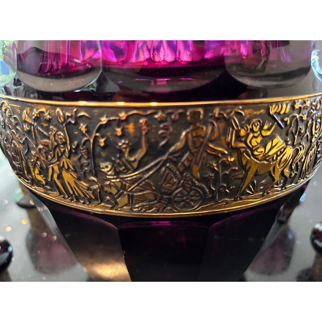 A punch or wine glass decorated with a gilt brass frieze in relief depicting figures from antiquity, accompanied by its...