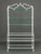 Hollywood Regency White Patinated Wrought Iron Etagere, with six glass shelves and faux bamboo motif. 86" H x 44" W x 20"...