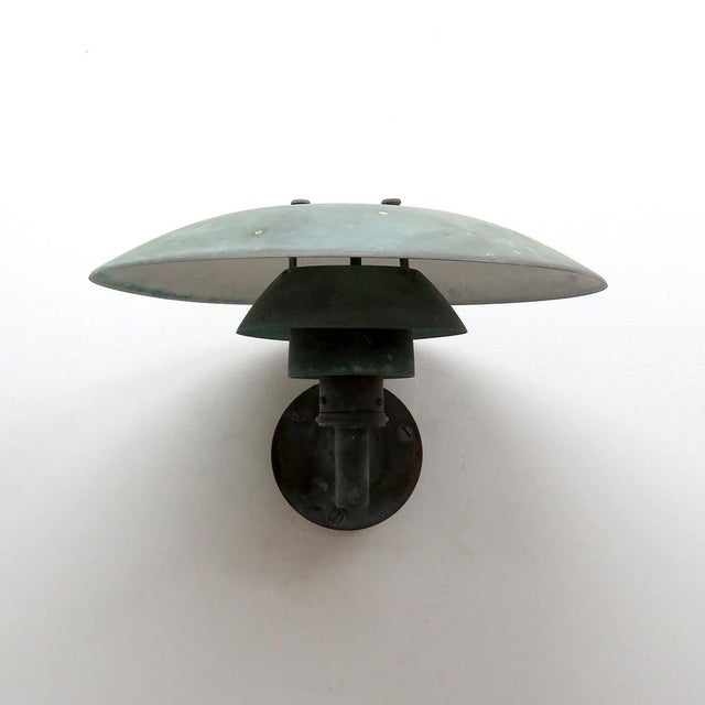 Legendary 1950s PH 4½/3 copper outdoor wall lights by Poul Henningsen, great copper patina, wired for US standards, one...