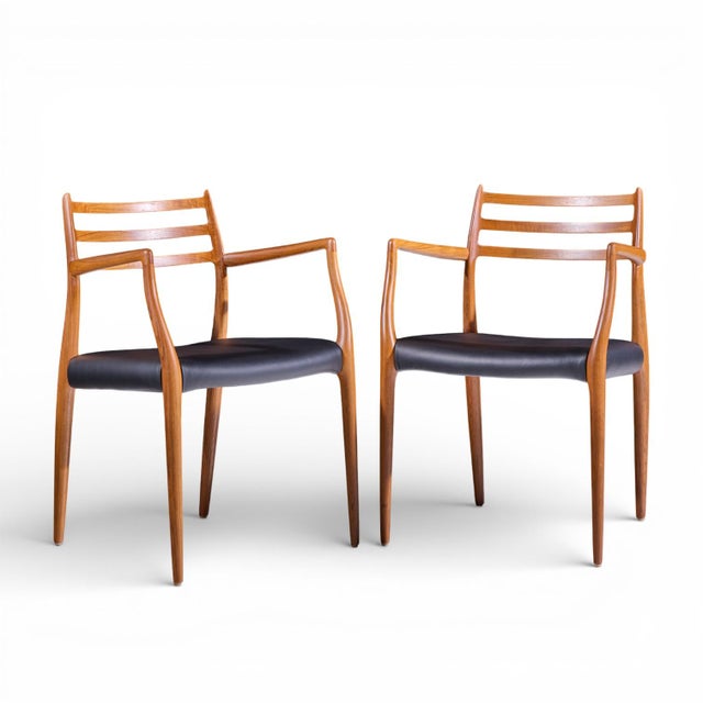 Niels Moller Model 62 Mid Century Danish Teak Captains Chairs - Pair Each chair measures: 21.75 wide x 20.25 deep x 31.25...