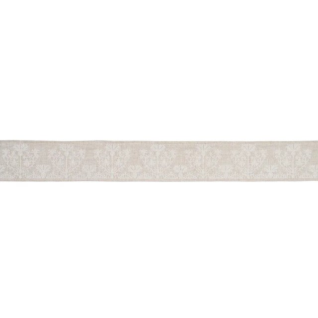 Inspired by an 18th-century trim, Custis Embroidered Tape features wonderful, stylized carnations stitched on a linen...