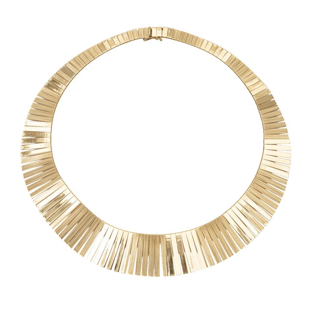 Stylish vintage 'Cleopatra' fringe necklace crafted in 14k yellow gold (circa 1980s). The choker length collar necklace...