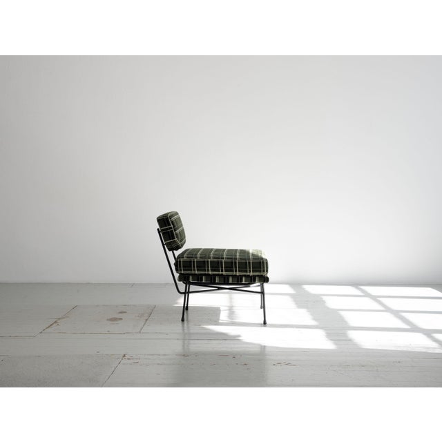 A pair of elettra armchairs, designed in 1954 by the italian architectural group bbpr (banfi, belgiojoso, peressutti, and...