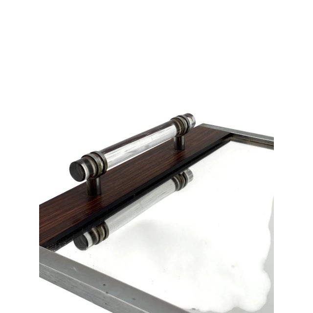 Modernist mirrored tray in the manner of Jacques Adnet France 1940 /1950 Acrylic, metal, glass, wood H 7 cm 53 × 35 cm...