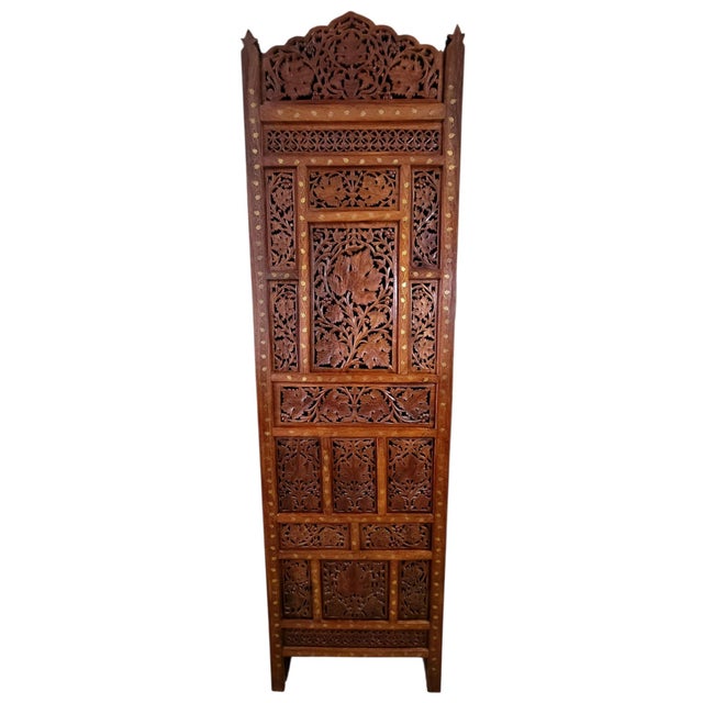 Beautiful meticulously carved teak wood with brass inlay screen room divider having 4 panels that accordion or zig zag....