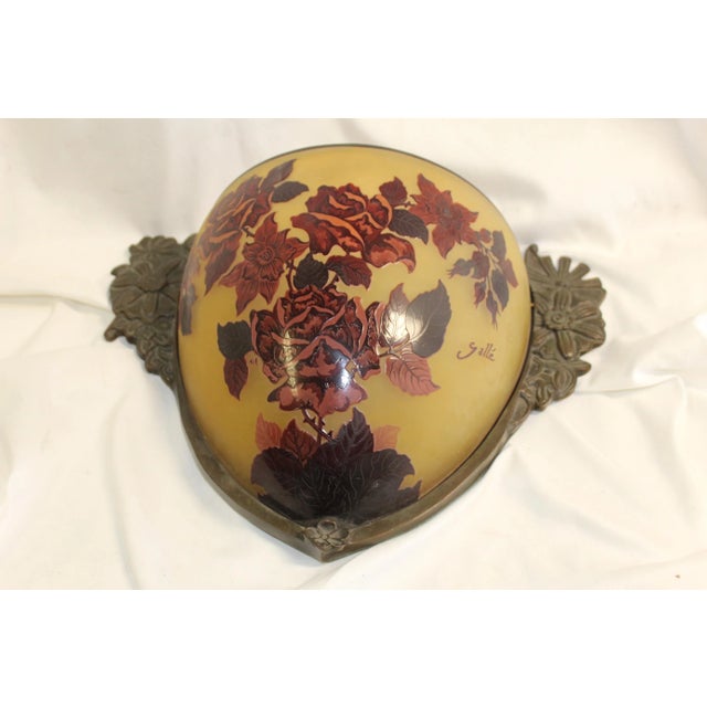 An Art Deco Modern Sconce made in the style of Galle', acid cut with Flower pattern through out. Looks amazing when lit...