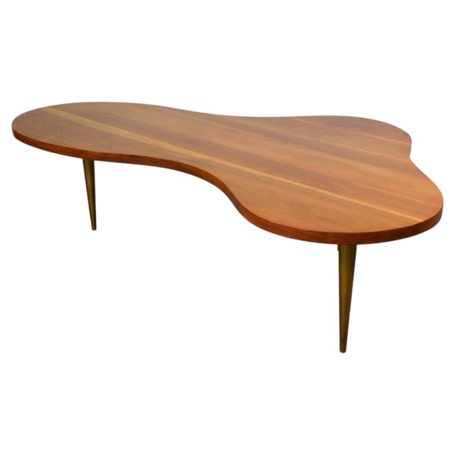 Iconic freeform coffee table designed by Robsjohn-Gibbings for Widdicomb, model 1759, circa 1950. This is the rare, larger...