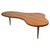 Iconic freeform coffee table designed by Robsjohn-Gibbings for Widdicomb, model 1759, circa 1950. This is the rare, larger...