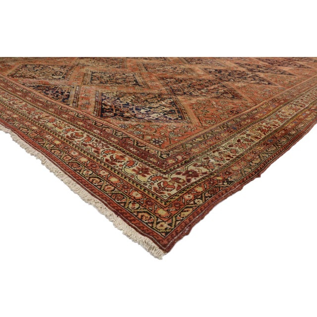 74262 Distressed Antique Persian Malayer Rug, 10'00 x 17'09. This magnificent hand-knotted wool distressed antique Persian...